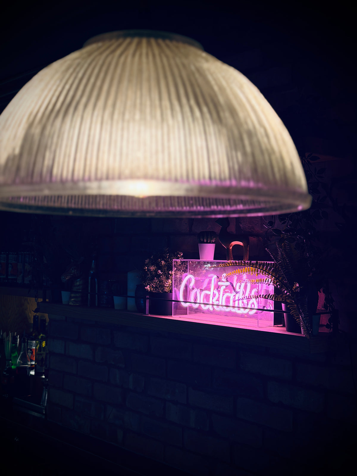 Private cocktail bar for hire in redditch with a neon cocktail sign