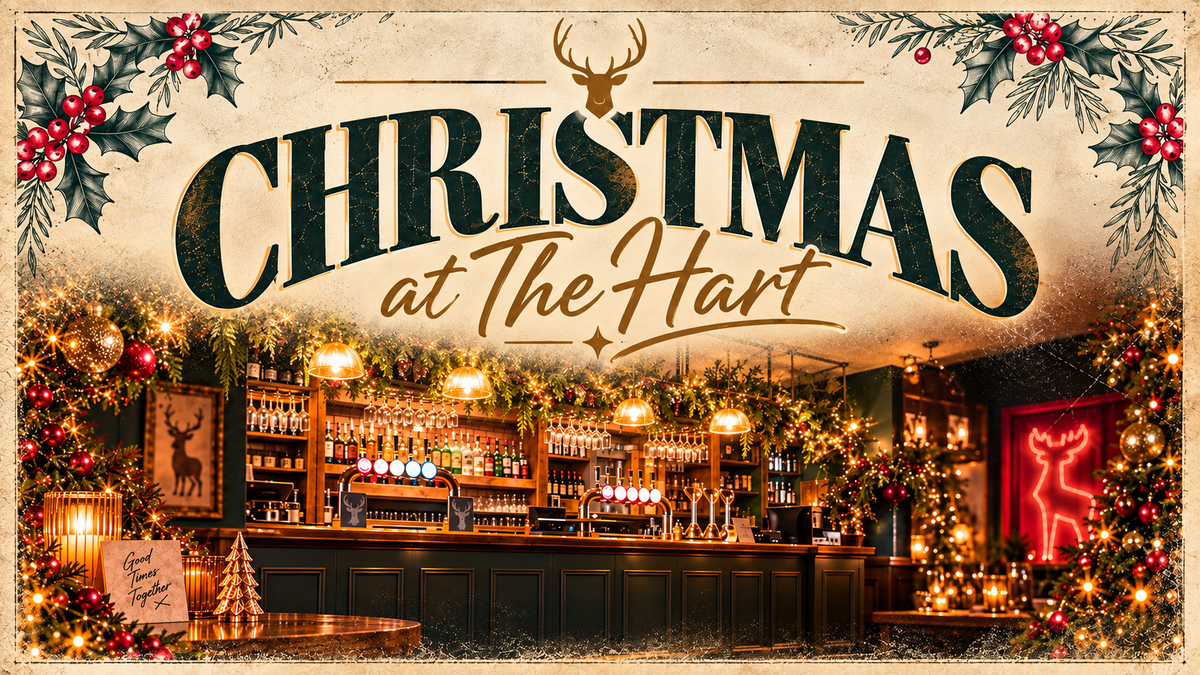 A festive Christmas-themed graphic with large text reading 'Christmas at The Hart' over a warmly lit bar interior decorated with lights, holly, pine branches, and reindeer motifs.