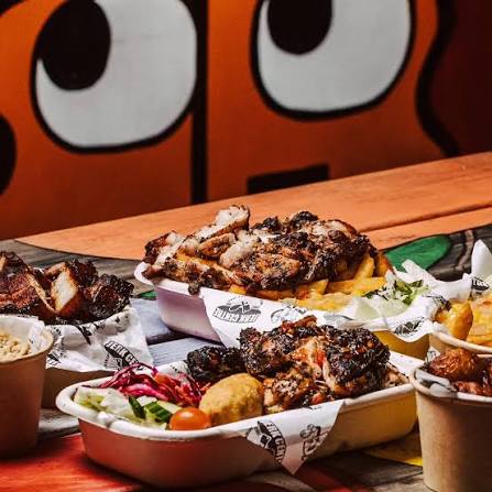 Jerk Centre BBQ plater of chicken wings and chips