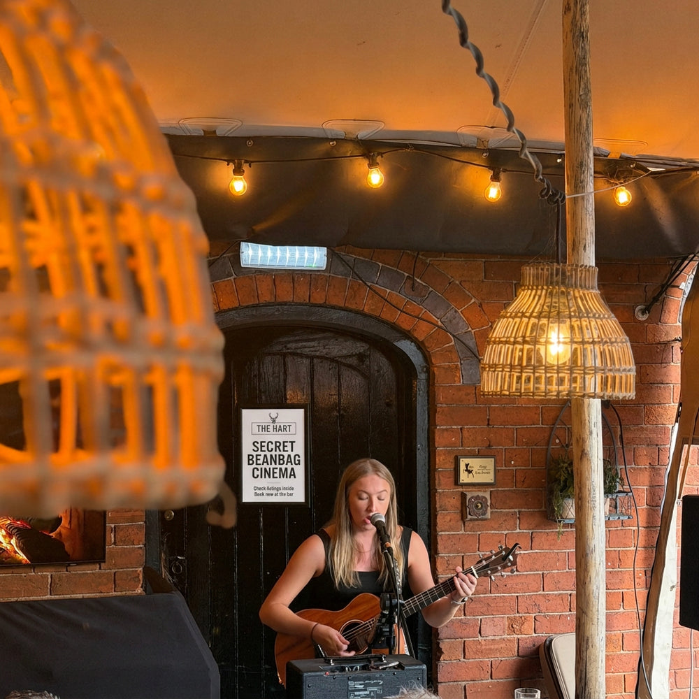 Live musician playing at Street Food Sundays