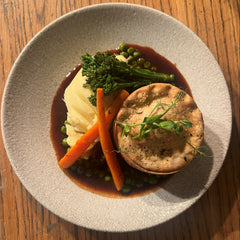The Hart pies served with creamy mashed potato, carrots, tenderstem broccoli, peas and rich gravy in Redditch