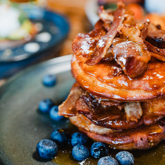 The Hart winter bacon and blueberry pancakes with maple syrup in Redditch