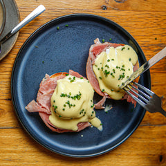 The Hart winter eggs Benedict with ham and hollandaise sauce, served with a latte in Redditch