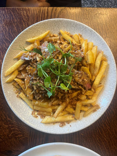 The Hart winter loaded steak fries with sliced steak, crispy onions and fresh greens in Redditch