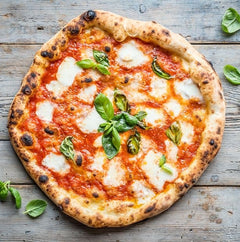 The Hart winter Margherita pizza with mozzarella, tomato sauce and fresh basil in Redditch