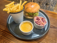 The Hart winter peri peri chicken burger served with golden fries, coleslaw and peri peri sauce in Redditch