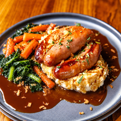 The Hart winter sausage and mash with rich onion gravy, crispy onions and fresh herbs in Redditch